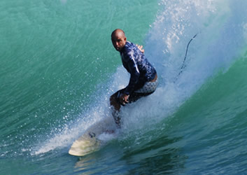 Charging at Dumpers, Luis Bertone, owner and surf instructor at La Escuela del Mar Surf School has been surfing for over 25 years and teaching for over 10